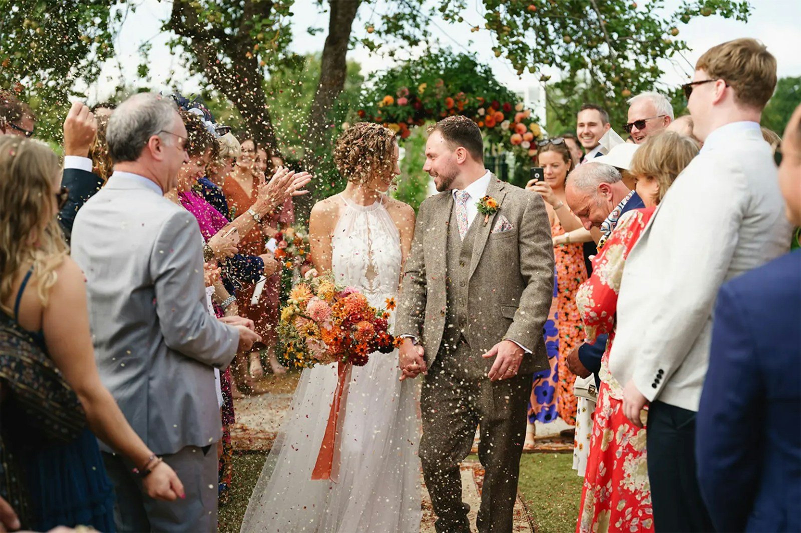 Friends celebrating a wedding outdoors